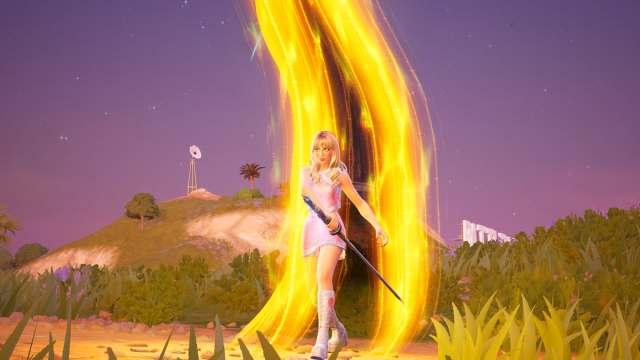 Standing in front of yellow and black rift gate in fortnite